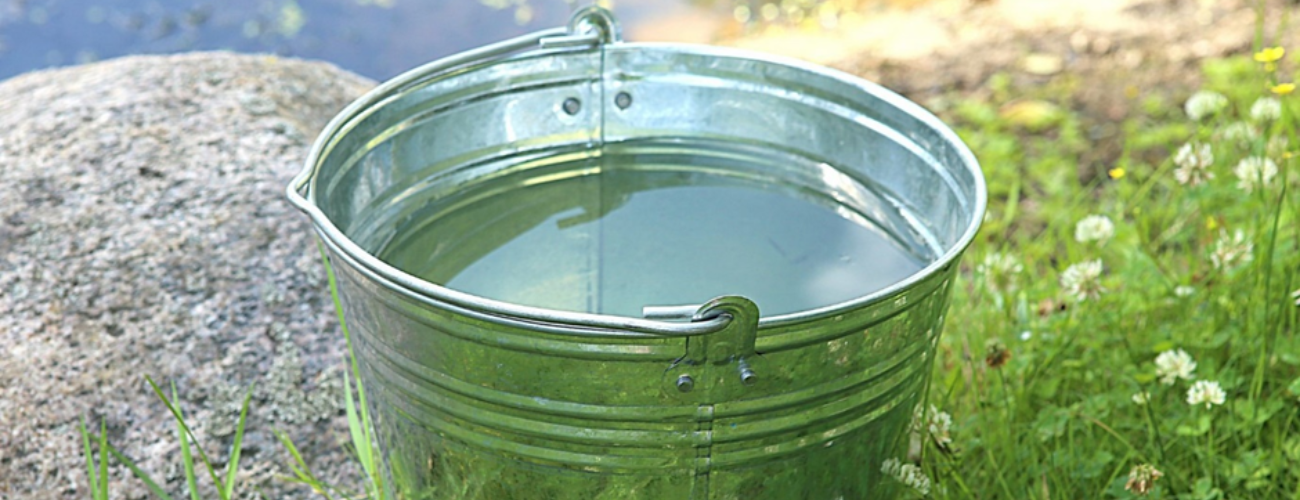 Leave a bucket of tap water uncovered outside for 24 hours before adding it to your pond